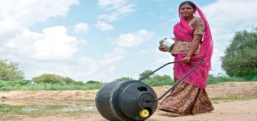 positive-news-waterwheel-indian village-woman
